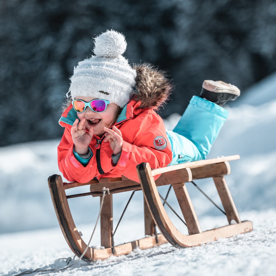 Luge en famille au Grand-Bornand - © C.Hudry